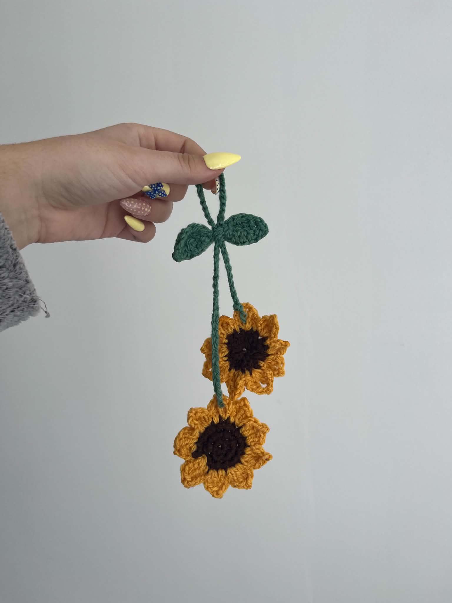 Suspension rétroviseur tournesols
